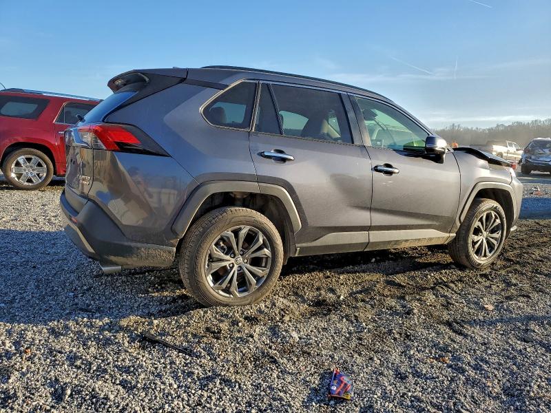 Photo 3 from auction – 2022 TOYOTA RAV4 LIMIT with VIN JTMD6RFV8ND520809