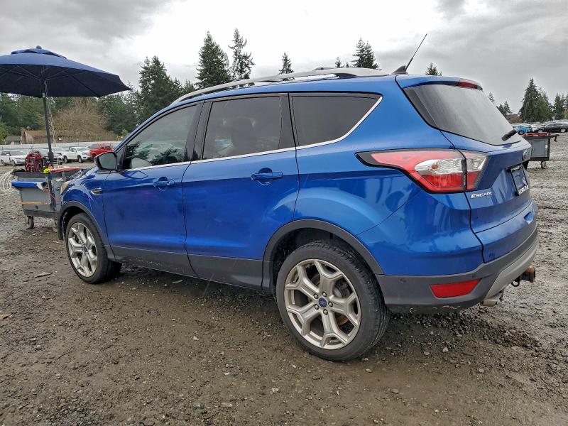 Photo 2 from auction – 2018 FORD ESCAPE TIT with VIN 1FMCU9J99JUC60700