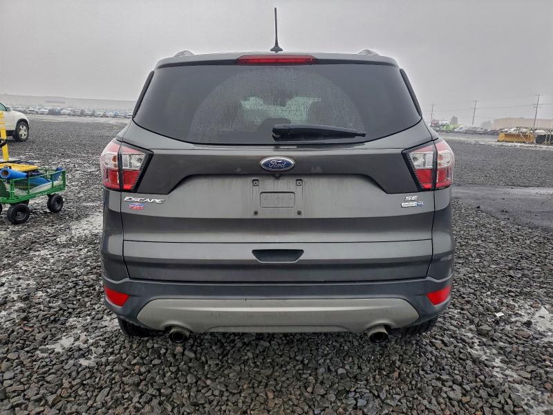 Photo 6 from auction – 2018 FORD ESCAPE SE with VIN 1FMCU9GDXJUA81268