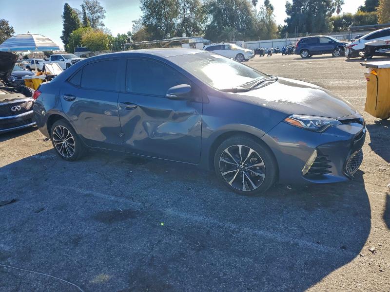 Photo 4 from auction – 2017 TOYOTA COROLLA L with VIN 5YFBURHE1HP689534
