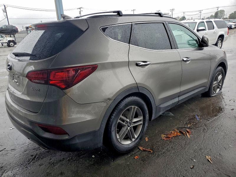Photo 3 from auction – 2017 HYUNDAI SANTA FE S with VIN 5NMZU3LB0HH016589