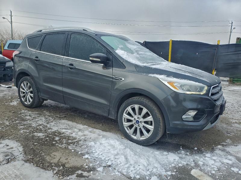 Photo 4 from auction – 2017 FORD ESCAPE with VIN 1FMCU0JD0HUD51865