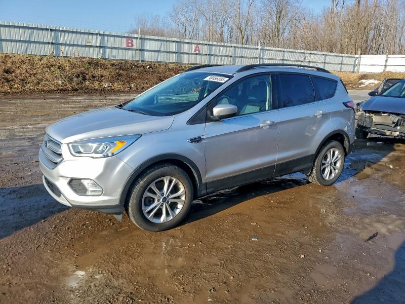 FORD ESCAPE SE 2017 with VIN 1FMCU9G92HUB76493 - Photo from auction