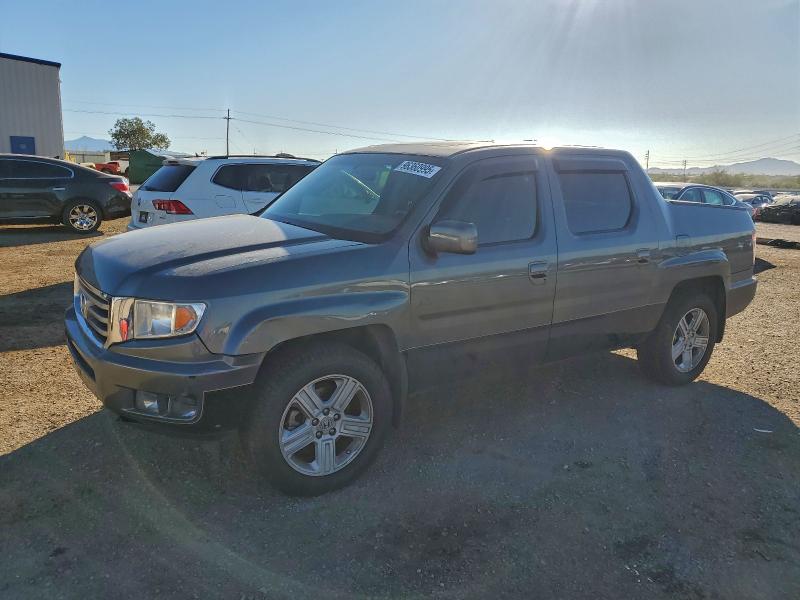 HONDA RIDGELINE 2012 with VIN 5FPYK1F57CB459027 - Photo from auction