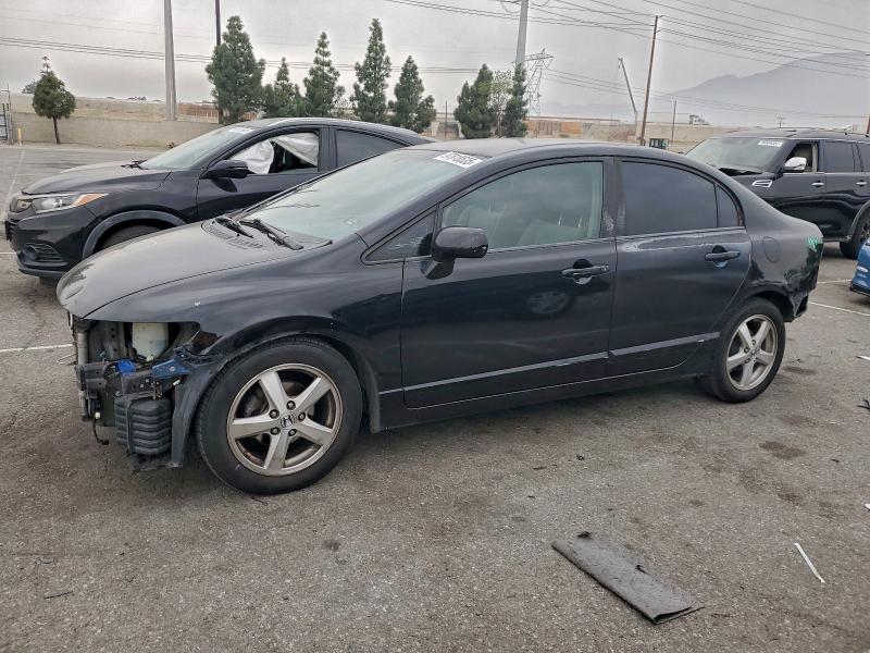 HONDA CIVIC LX 2011 with VIN 2HGFA1F50BH538780 - Photo from auction