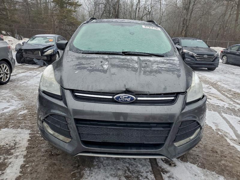 Photo 5 from auction – 2015 FORD ESCAPE SE with VIN 1FMCU9GX1FUB52617