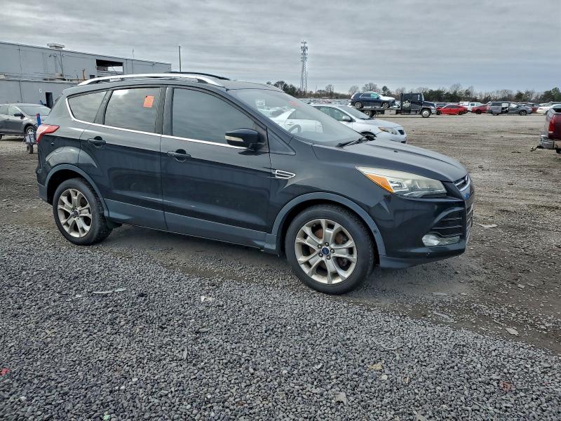 Photo 4 from auction – 2015 FORD ESCAPE with VIN 1FMCU9J94FUC62619