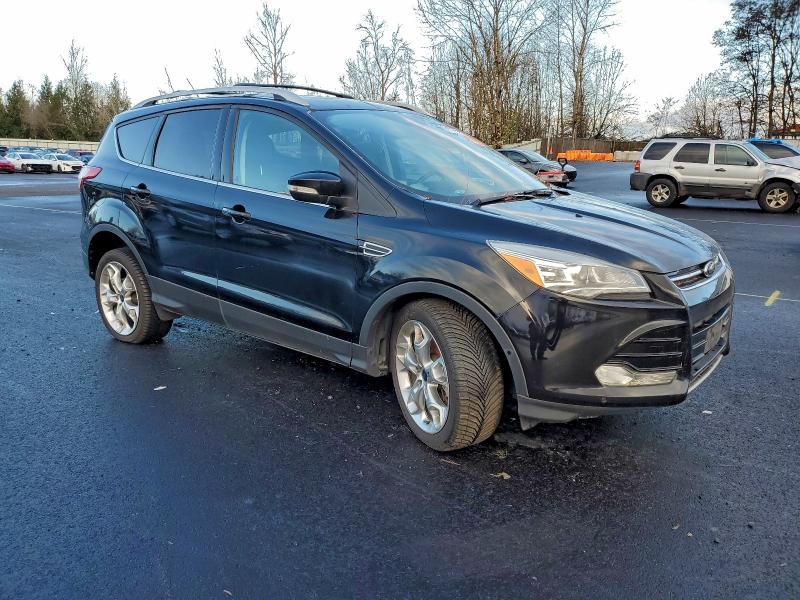 Photo 4 from auction – 2016 FORD ESCAPE TIT with VIN 1FMCU9J99GUC44702