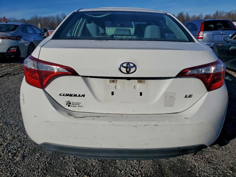 Photo 6 from auction – 2014 TOYOTA COROLLA L with VIN 5YFBURHE3EP144768