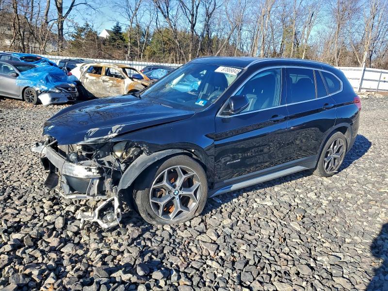 BMW X1 XDRIVE2 2017 with VIN WBXHT3Z37H4A53572 - Photo from auction
