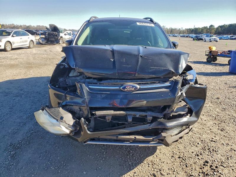 Photo 5 from auction – 2015 FORD ESCAPE SE with VIN 1FMCU9GX4FUA97273