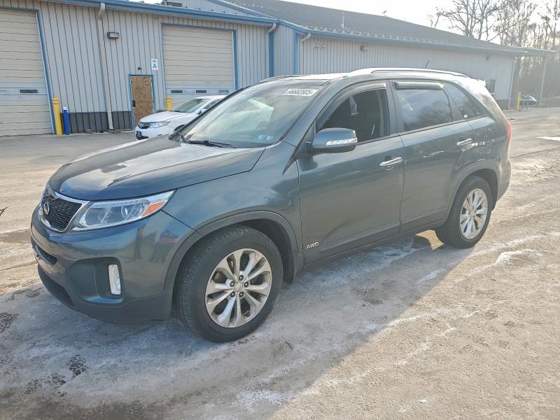 KIA SORENTO EX 2014 with VIN 5XYKUDA73EG497465 - Photo from auction