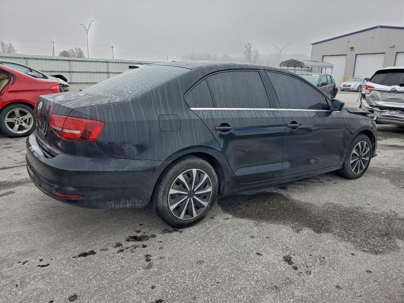 Photo 3 from auction – 2017 VOLKSWAGEN JETTA S with VIN 3VW2B7AJ3HM386065