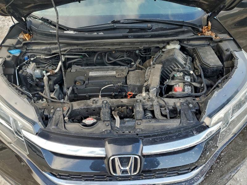 Photo 12 from auction – 2015 HONDA CR-V LX with VIN 5J6RM4H38FL075290