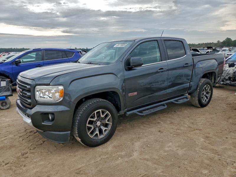 GMC CANYON SLE 2015 with VIN 1GTG5BE32F1247005 - Photo from auction