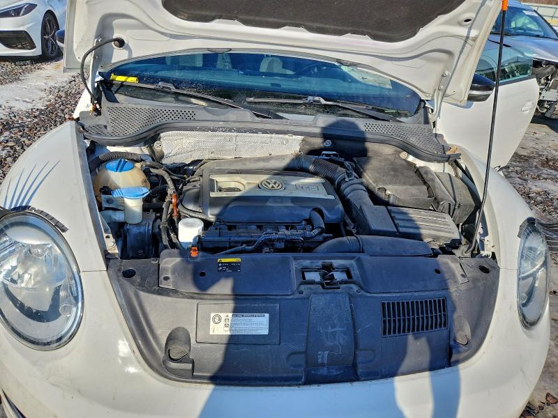 Photo 11 from auction – 2012 VOLKSWAGEN BEETLE TUR with VIN 3VWVA7AT3CM603883