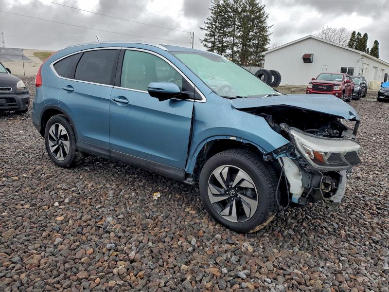 Photo 4 from auction – 2015 HONDA CR-V TOURI with VIN 5J6RM4H95FL087336