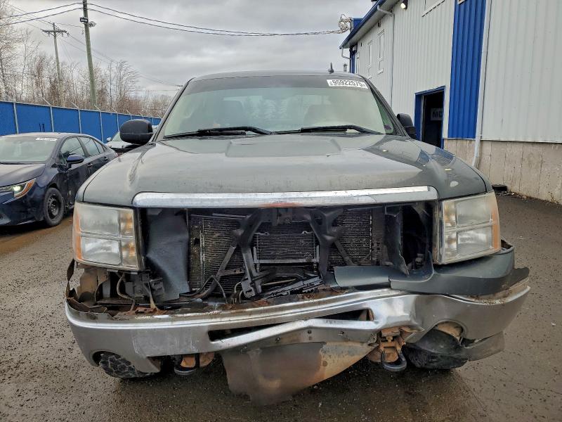 Photo 5 from auction – 2011 GMC SIERRA K15 with VIN 1GTR2UEA0BZ201583