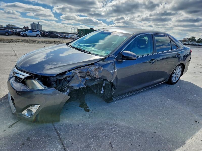 TOYOTA CAMRY HYBR 2012 with VIN 4T1BD1FK9CU048214 - Photo from auction