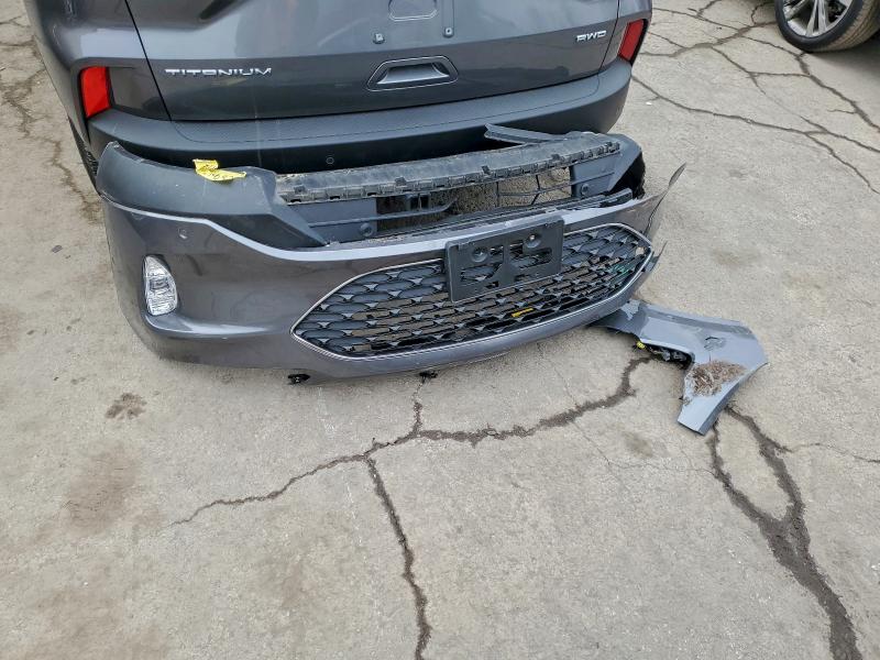 Photo 13 from auction – 2021 FORD ESCAPE TIT with VIN 1FMCU9J93MUA62151