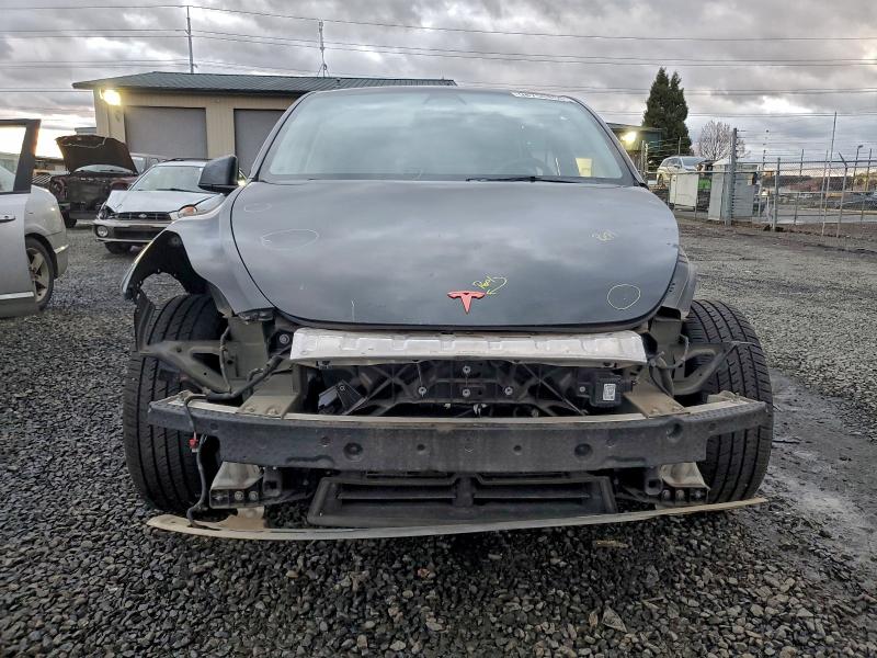 Photo 5 from auction – 2022 TESLA MODEL Y with VIN 7SAYGDEF5NF398627