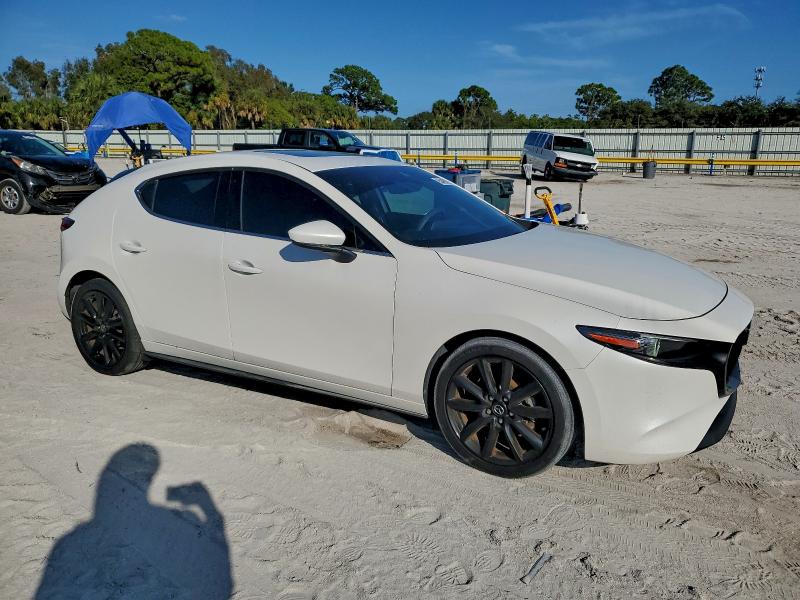 Photo 4 from auction – 2021 MAZDA 3 PREMIUM with VIN JM1BPAML4M1306651