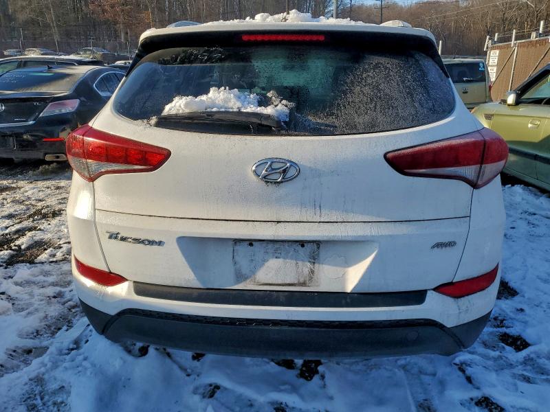Photo 6 from auction – 2016 HYUNDAI TUCSON LIM with VIN KM8J3CA41GU035241