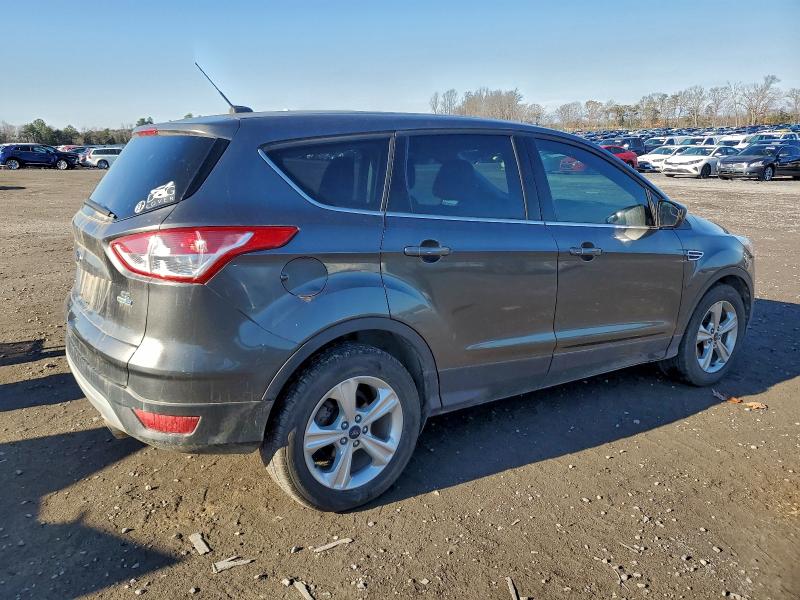 Photo 3 from auction – 2015 FORD ESCAPE SE with VIN 1FMCU9G99FUC21300