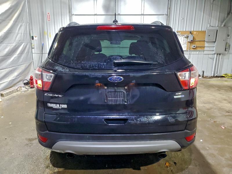 Photo 6 from auction – 2017 FORD ESCAPE SE with VIN 1FMCU9GD6HUE50685