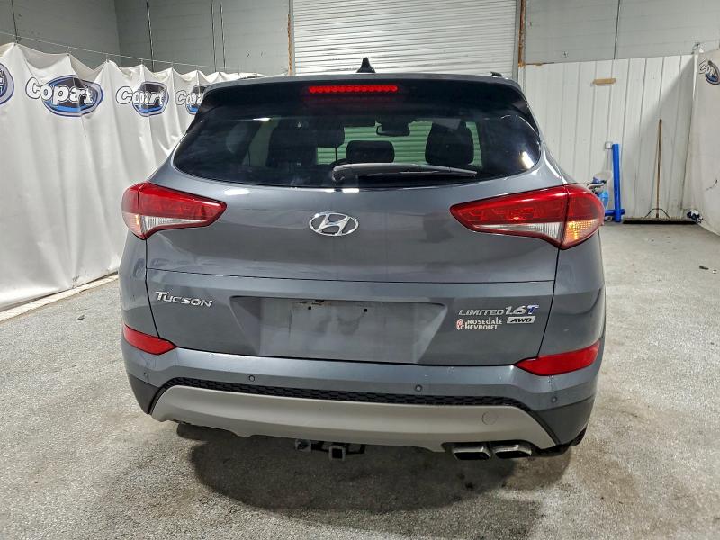 Photo 6 from auction – 2017 HYUNDAI TUCSON LIM with VIN KM8J3CA29HU296018