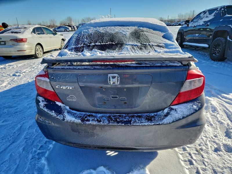 Photo 6 from auction – 2012 HONDA CIVIC LX with VIN 2HGFB2E40CH022545