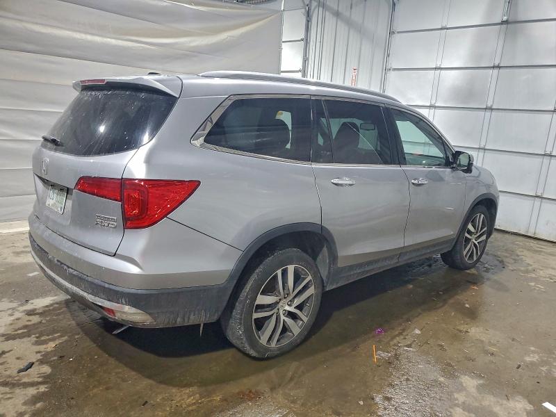 Photo 3 from auction – 2016 HONDA PILOT TOUR with VIN 5FNYF6H94GB104817