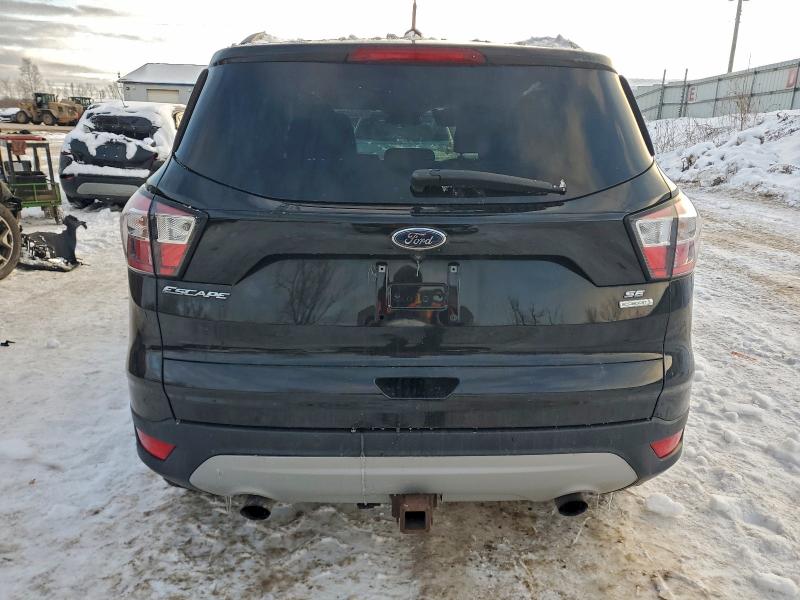 Photo 6 from auction – 2017 FORD ESCAPE SE with VIN 1FMCU0G95HUE34338