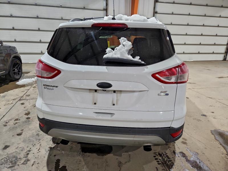 Photo 6 from auction – 2015 FORD ESCAPE SE with VIN 1FMCU9G94FUB51124