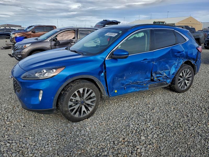 Photo 1 from auction – 2020 FORD ESCAPE TIT with VIN 1FMCU9DZ9LUB04672