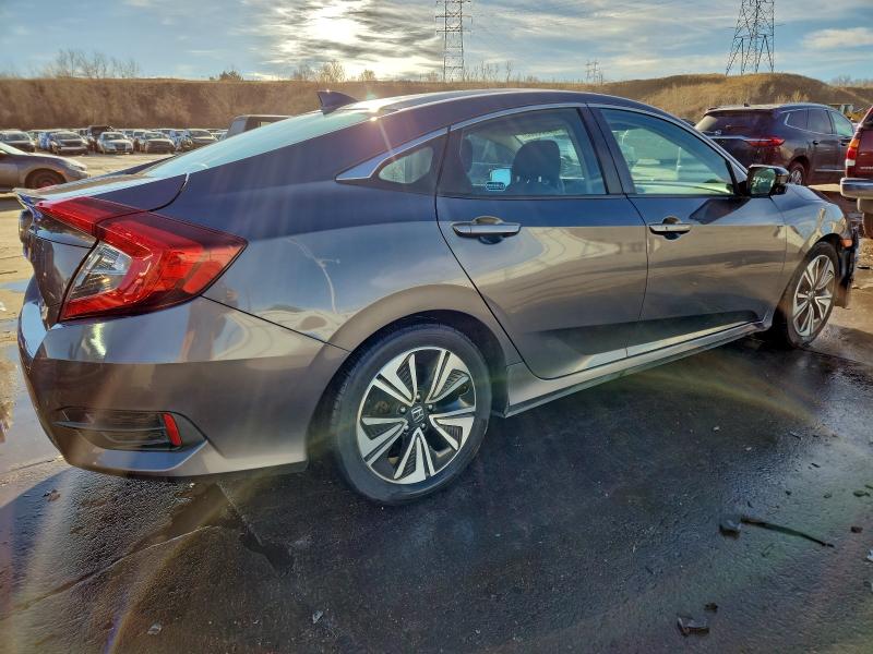 Photo 3 from auction – 2016 HONDA CIVIC EX with VIN 2HGFC1F37GH650458