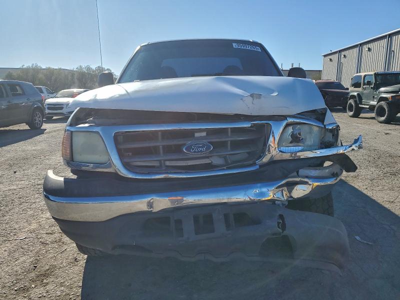 Photo 5 from auction – 2000 FORD F150 with VIN 1FTRX18W4YNB17399