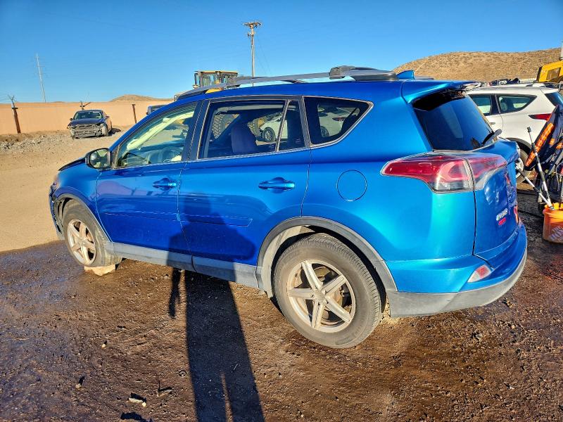 Photo 2 from auction – 2017 TOYOTA RAV4 LE with VIN JTMZFREV1HJ711310