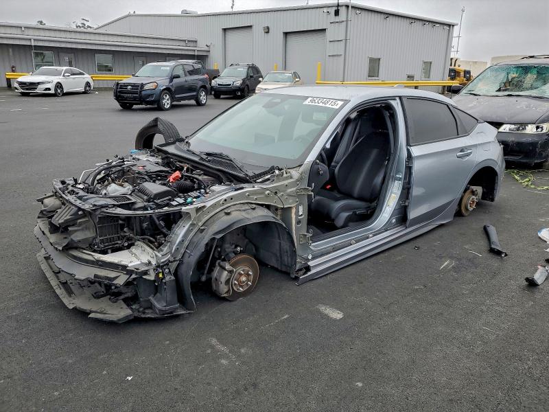 HONDA CIVIC 2022 with VIN 19XFL2H89NE023556 - Photo from auction
