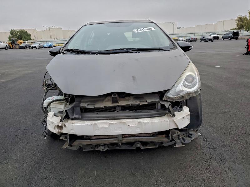 Photo 5 from auction – 2015 TOYOTA PRIUS C with VIN JTDKDTB34F1585920