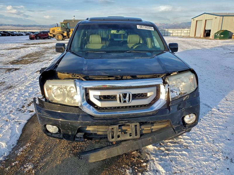 Photo 5 from auction – 2011 HONDA PILOT EXL with VIN 5FNYF4H51BB085265