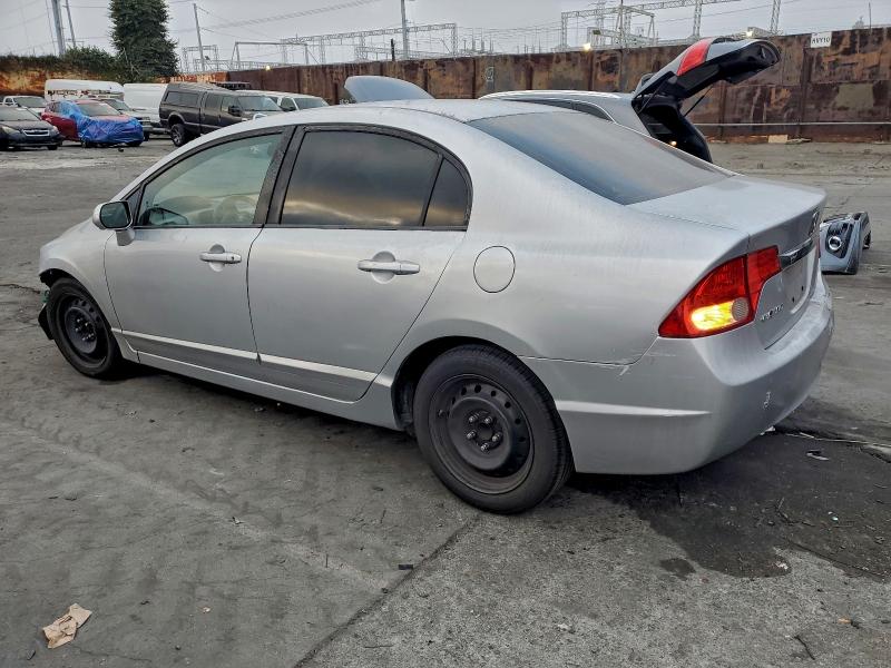Photo 2 from auction – 2011 HONDA CIVIC LX with VIN 19XFA1F54BE027762