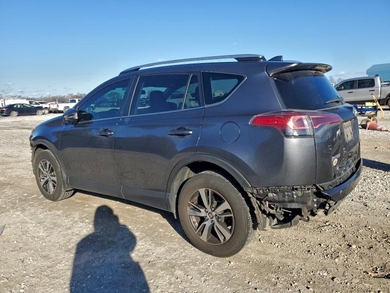 Photo 2 from auction – 2017 TOYOTA RAV4 XLE with VIN JTMWFREV3HD097295