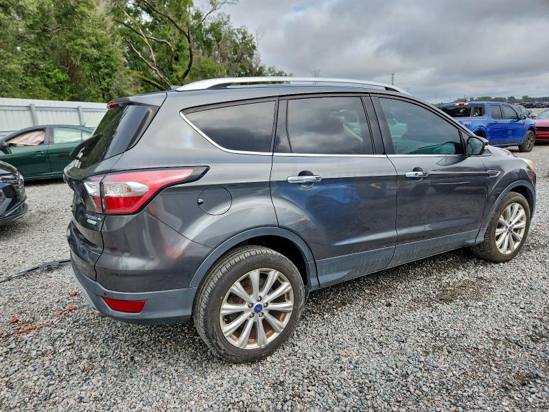 Photo 3 from auction – 2017 FORD ESCAPE TIT with VIN 1FMCU0JDXHUD16122