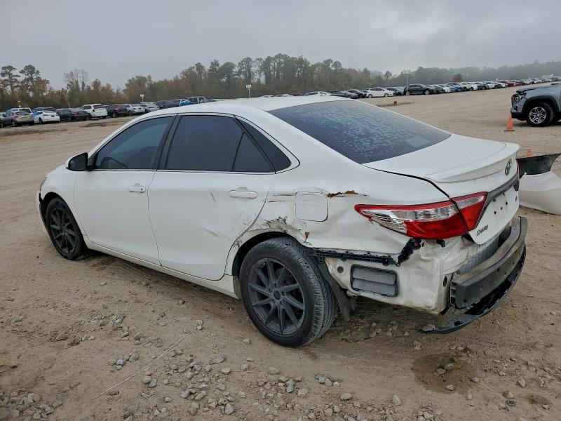 Photo 2 from auction – 2016 TOYOTA CAMRY LE with VIN 4T1BF1FK0GU173974