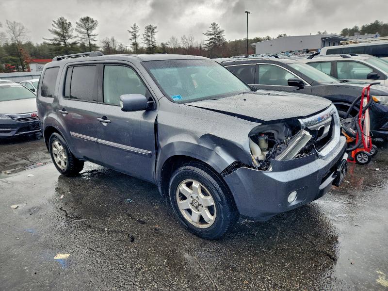 Photo 4 from auction – 2010 HONDA PILOT TOUR with VIN 5FNYF4H92AB021561