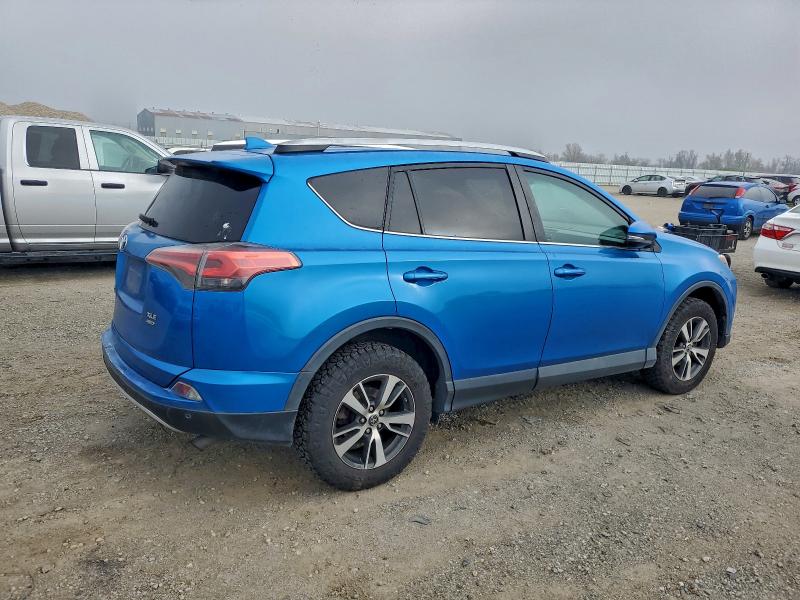 Photo 3 from auction – 2016 TOYOTA RAV4 XLE with VIN 2T3RFREV4GW472898