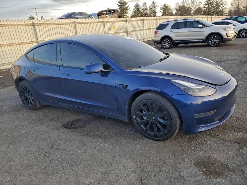 Photo 4 from auction – 2022 TESLA MODEL 3 with VIN 5YJ3E1EA2NF288313