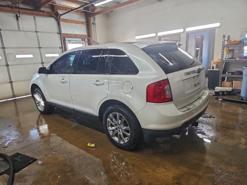 Photo 2 from auction – 2011 FORD EDGE LIMIT with VIN 2FMDK4KC7BBA95017