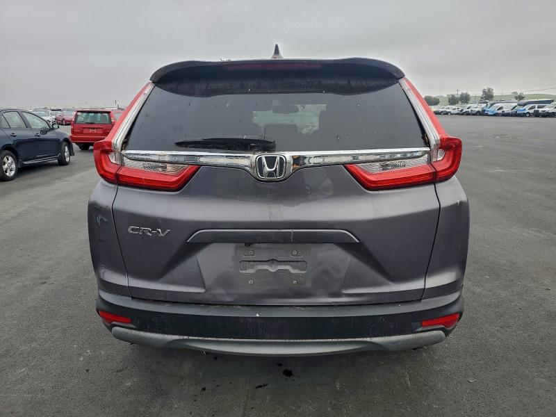 Photo 6 from auction – 2018 HONDA CR-V with VIN 7FARW1H83JE034107